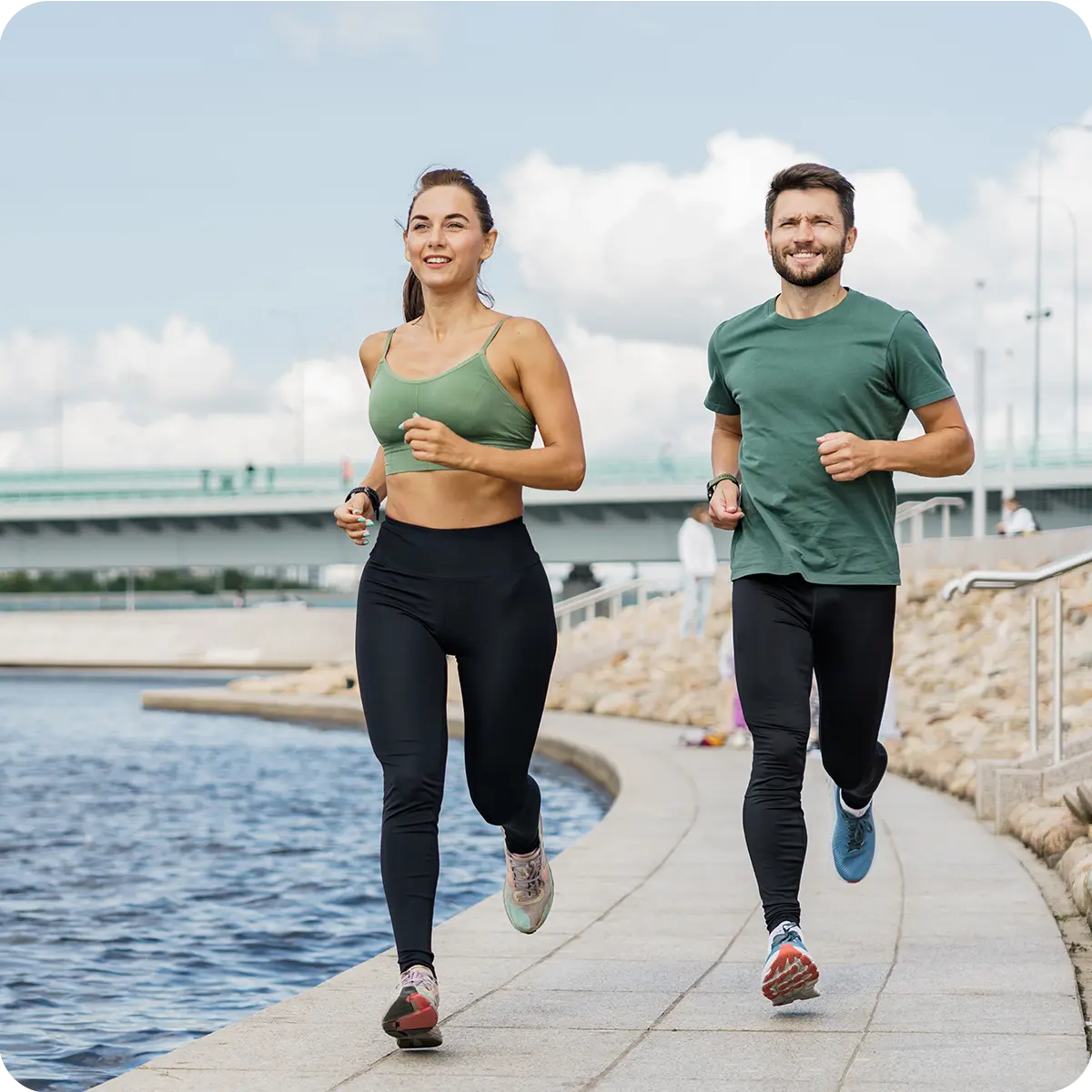 Photo of two people (a man and a woman) running with energy and good coordination, symbolizing healthy nerve function and signaling supported by Inlife Magnesium Glycinate.
